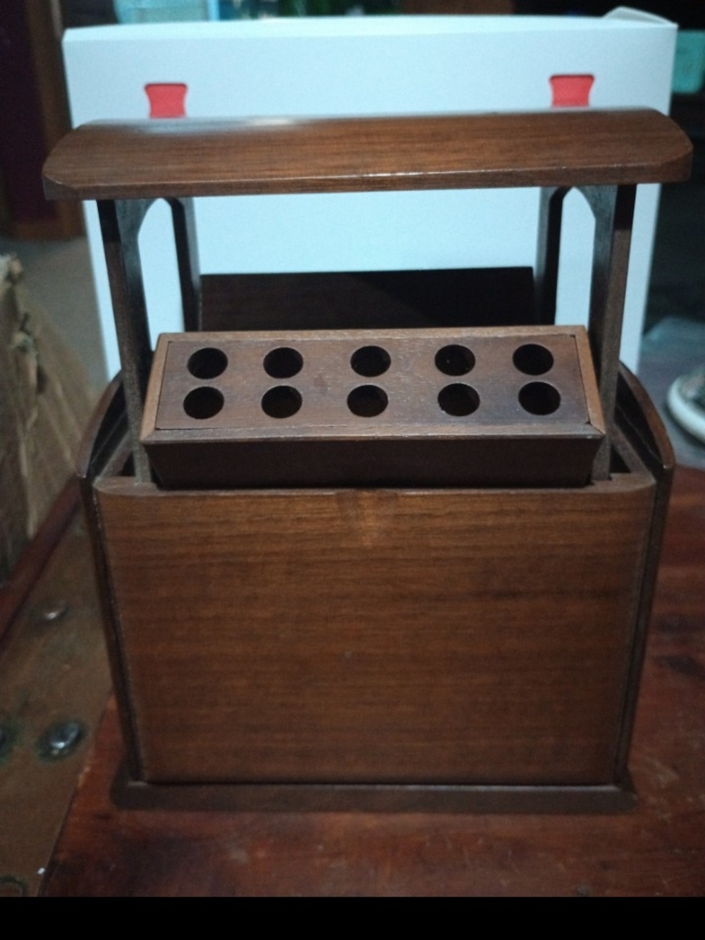 Vintage musical wooden cigarette dispenser. 7x4x5.5 in. Marked Japan on bottom.